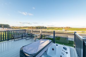 Outside of a luxury lodge with hot tub near st andrews